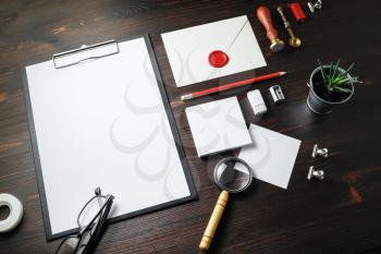 Blank corporate stationery set on wooden background. Template for branding identity.