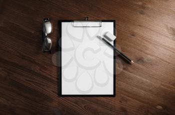 Blank branding stationery set on wood table background. Blank objects for placing your design. Flat lay.