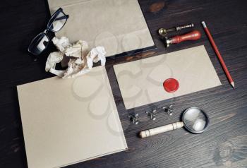 Blank retro stationery set on wood table background. Corporate branding stationery template.