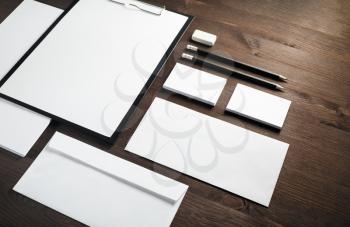 Corporate identity mockup. Blank stationery set on wooden background. Responsive design template.