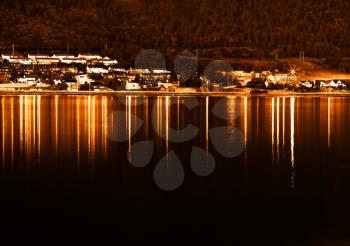 Sunset Tromso community with lights reflections background hd