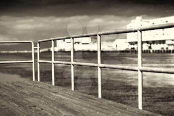 Quay border fence in sepia background hd
