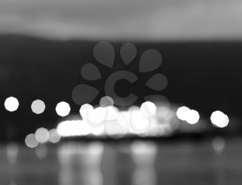 Black and white Norway night ship with lights bokeh background hd