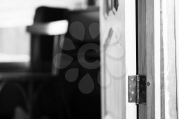 Vertical black and white opened door bokeh background hd