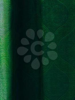 Vertical vivid vibrant green curtain drapery background backdrop