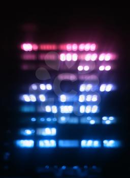 Vertical pink and purple office building illumination bokeh background hd