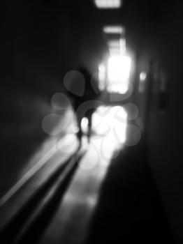 Vertical black and white man in office corridor bokeh background hd