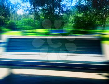 Park bench motion blur background