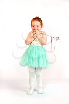 Fashion little girl in green dress, in catwalk model pose, stock photo. Image 03