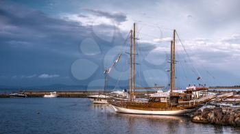 Nessebar, Bulgaria – 07.10.2019.  Pleasure boats at the pier of the old town of Nessebar in Bulgaria on a summer morning