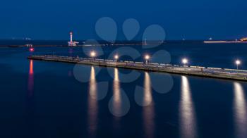 Panoramic view of the sea port and cargo terminal in Odessa, Ukraine, at the summer night
