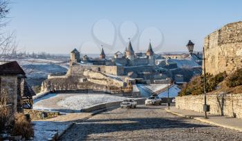 Kamianets-Podilskyi, Ukraine 01.07.2020. City gate of the Kamianets-Podilskyi old town on a sunny winter morning