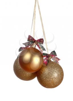 Three gold Christmas balls isolated on white background