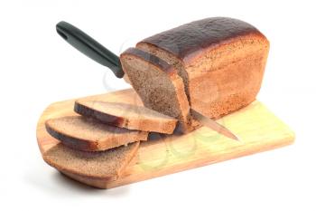 Rye bread and knife on hardboard isolated on white background