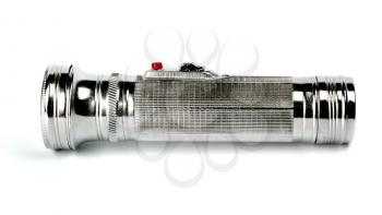 A classic metal flashlight isolated on white background