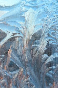 Natural frosty pattern on winter window glass