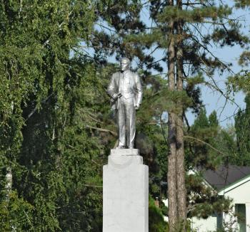 Old monument to Lenin. A concrete bust of Lenin near recreation center in the rural settlement.