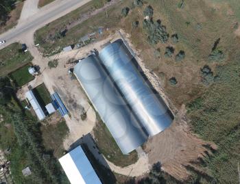 Top view of the hangars. Hangar of galvanized metal sheets for the storage of agricultural products and storage equipment.