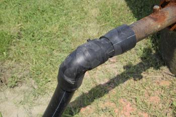 The pipe from the water tower. Steel or plastic pipe, valve and knee on the tube.