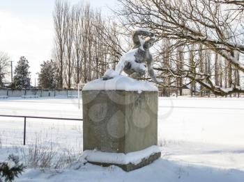 Monument to the football player in the winter