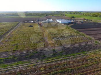 Frameworks of greenhouses, top view. Construction of greenhouses in the field. Agriculture, agrotechnics of closed ground.