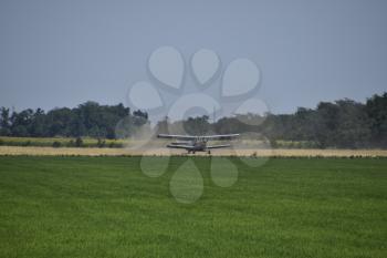 Aircraft agricultural aviation AN-2. Landing on the field for filling fertilizers An-2.