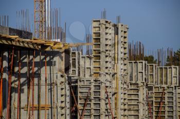 Construction of a residential building, reinforced concrete structures, cement and fittings.