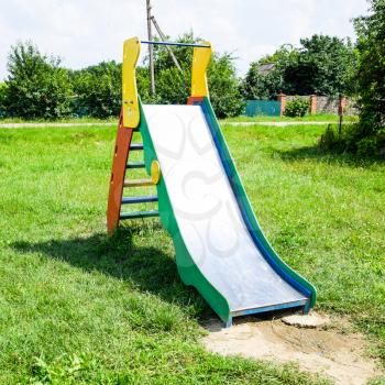 a Children's playground. Swing, carousel and slide