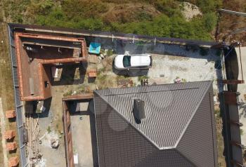 The brown roof of the new house. Home construction.