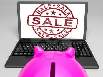 Sale Stamp On Laptop Showing Cheap Merchandise Or Promotional Prices