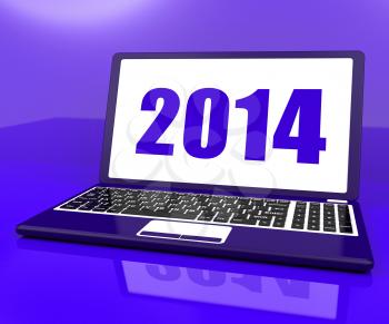 Two Thousand And Fourteen On Laptop Showing Year 2014