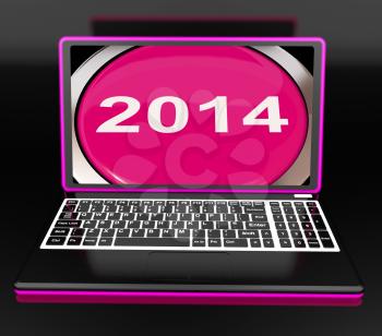 Two Thousand And Fourteen On Laptop Showing New Year 2014