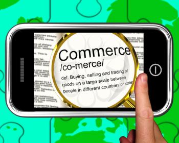 Commerce Definition On Smartphone Showing Commercial Activities And Trading Products