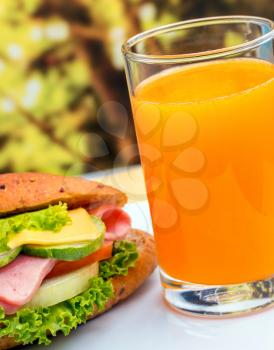 Ham Roll Juice Showing Orange Drink And Sandwich