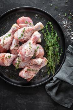 Raw marinated chicken meat, chicken legs