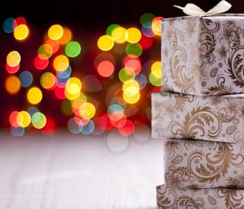 Magic Christmas gifts background of blurred lights
