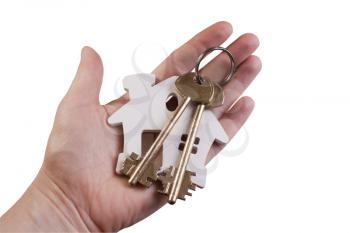 house key in hand on a white background.Real estate concept.