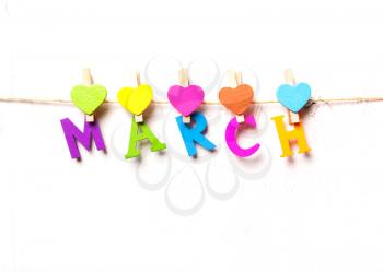 the month of March of the colored letters on a white background