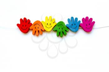 smiling palm of rainbow colors, background LGBT  on white background