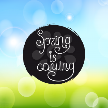 vector illustration of Handwriting inscription Spring is coming on a watercolor round spot on the light bokeh background