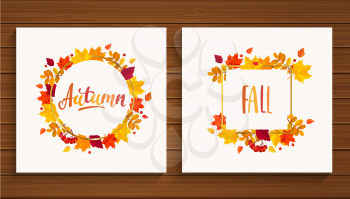 Autumn and Fall cards in frame from autumn leaves on wooden background. Vector illustration.