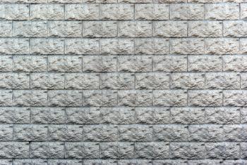 Silver wall from bricks. Element of design.