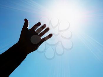 Hand to sun. Element of design.