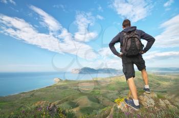 Man and mountain sea landscape. Emotional and conceptual scene.