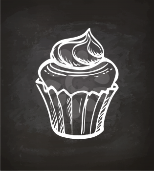 Cupcake with cream. Chalk sketch on blackboard. Hand drawn vector illustration. Retro style.