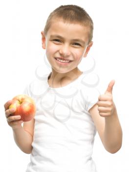 Portrait of a happy little boy with red apples, isolated over white