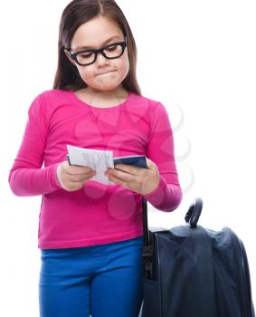 Tourism - smiling girl with travel bag, ticket and passport, isolated over white