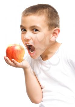 Portrait of a happy little boy with red apples, isolated over white