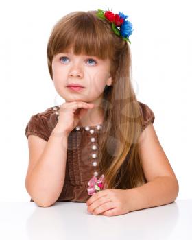 Portrait of a cute little girl, isolated over white