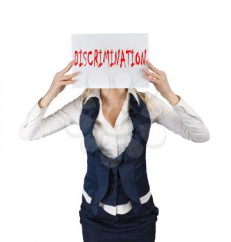 Discrimination concept. A woman holds a poster with the word discrimination